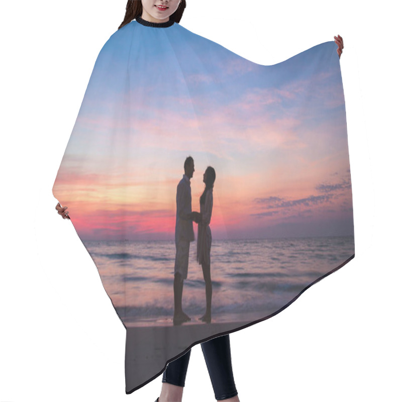 Personality  Silhouette Of A Loving Couple Holding Hands At Sunset On The Sea. Hair Cutting Cape