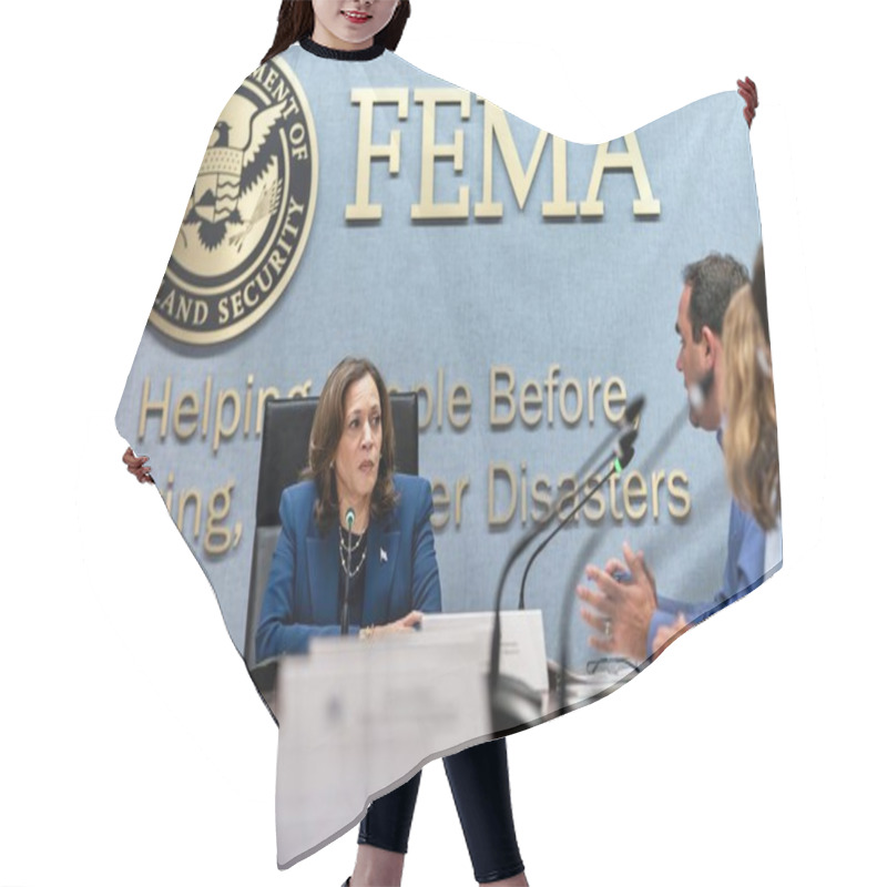 Personality  Washington D.C., USA - September 30 2024: Vice President Kamala Harris At A Briefing At FEMA (Federal Emergency Management Agency) After The Impact Of Hurricane Helene Hair Cutting Cape