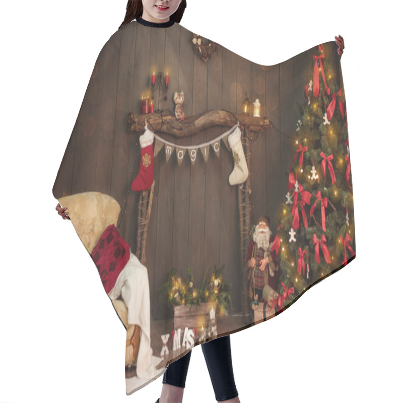 Personality  On A Wooden Fireplace Made Of Old Logs, There Is A Stretch Of Flags With The Inscription Magic, White-red Socks For Santa Claus's Gifts Hang On The Sides. New Year Card With Christmas Tree. Copy Space Hair Cutting Cape