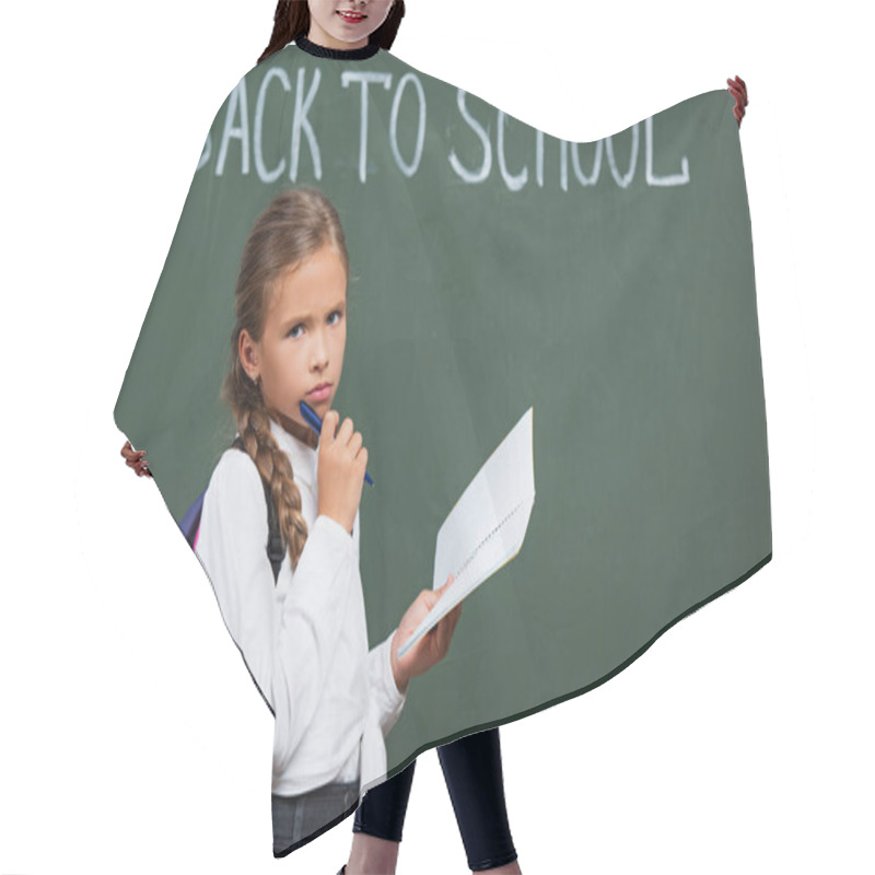 Personality  Upset Schoolgirl With Backpack Holding Notebook And Pen Near Chalkboard With Back To School Lettering Hair Cutting Cape