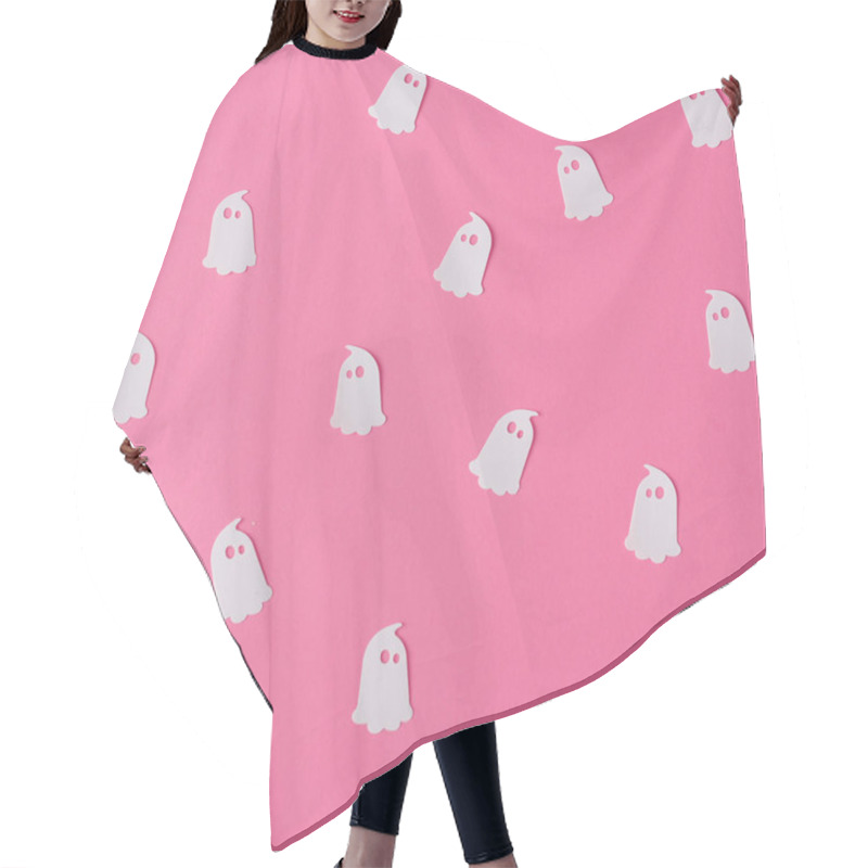 Personality  Creative Pink Pattern Made Of Ghosts. Minimal Flat Lay. Halloween Concept. Hair Cutting Cape