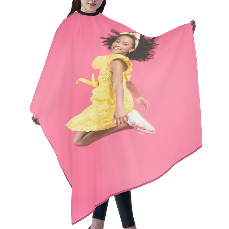 Personality  Side View Of Happy Curly African American Child In Yellow Outfit Jumping On Pink Background Hair Cutting Cape