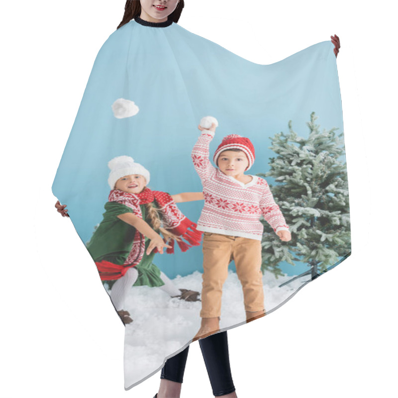 Personality  Children In Winter Outfit Playing Snowballs Near Christmas Trees On Blue Hair Cutting Cape