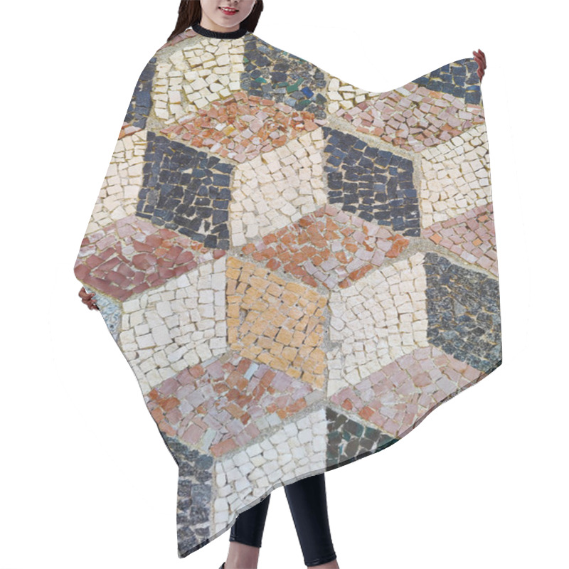 Personality  A Vibrant Mosaic Floor Showing An Intricate 3D Cube-like Pattern, Crafted From Small, Multi-colored Stones. This Visually Engaging Design Combines Earthy And Neutral Colors, Arranged To Create The Illusion Of Depth And Dimensionality. Hair Cutting Cape