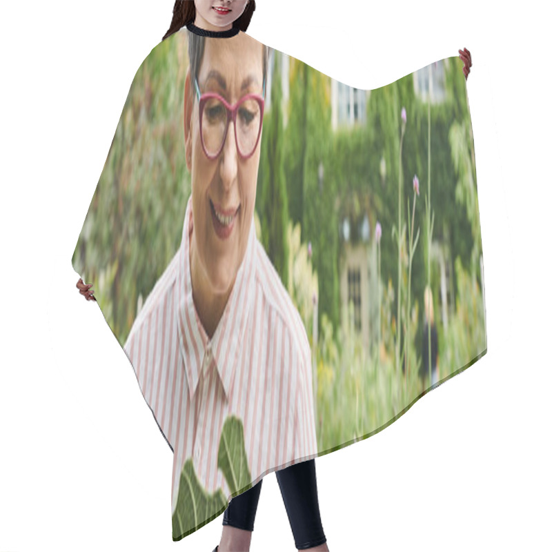 Personality  Beautiful Happy Mature Woman With Glasses Working In Vivid Green Garden And Smiling Joyfully, Banner Hair Cutting Cape