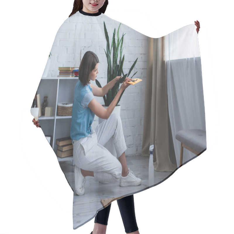 Personality  Side View Of Young Woman Cleaning Potted Plant In Living Room Hair Cutting Cape