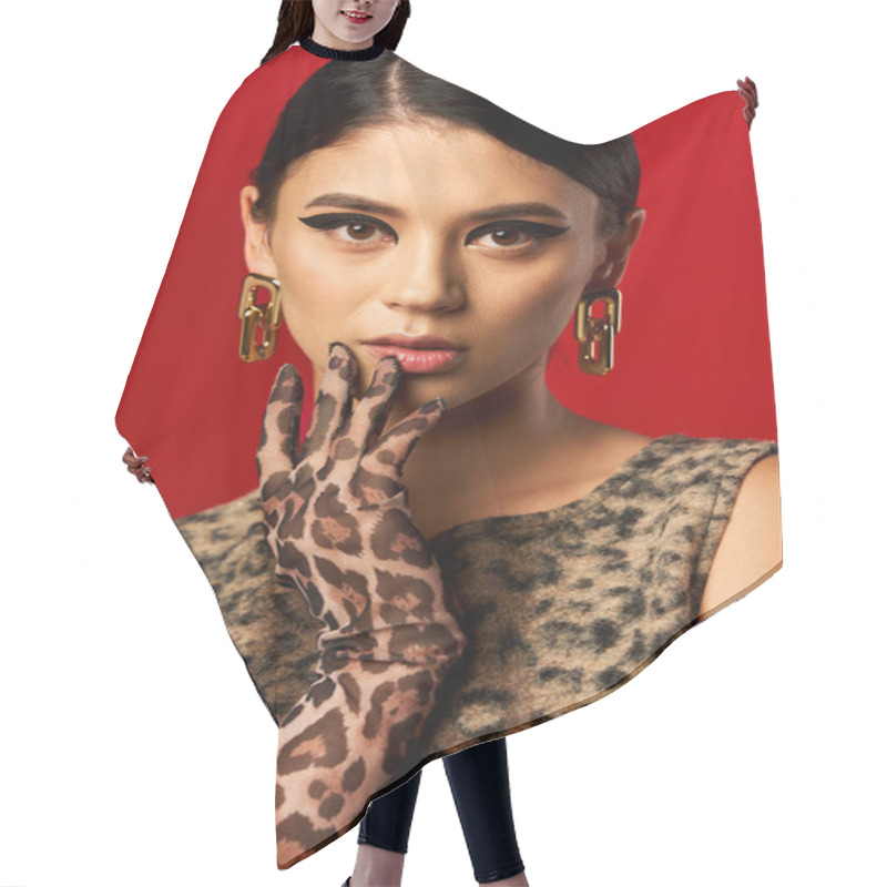 Personality  A Young Woman In A Leopard Print Dress And Gloves Poses With A Bold And Confident Expression. Hair Cutting Cape