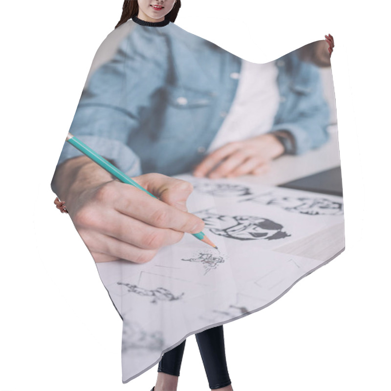 Personality  Cropped View Of Illustrator Drawing Cartoon Sketches On Paper  Hair Cutting Cape