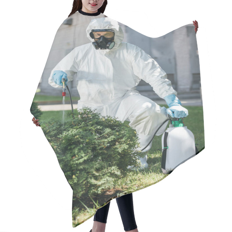 Personality  Pest Control Worker In Uniform Spraying Pesticides On Bush  Hair Cutting Cape