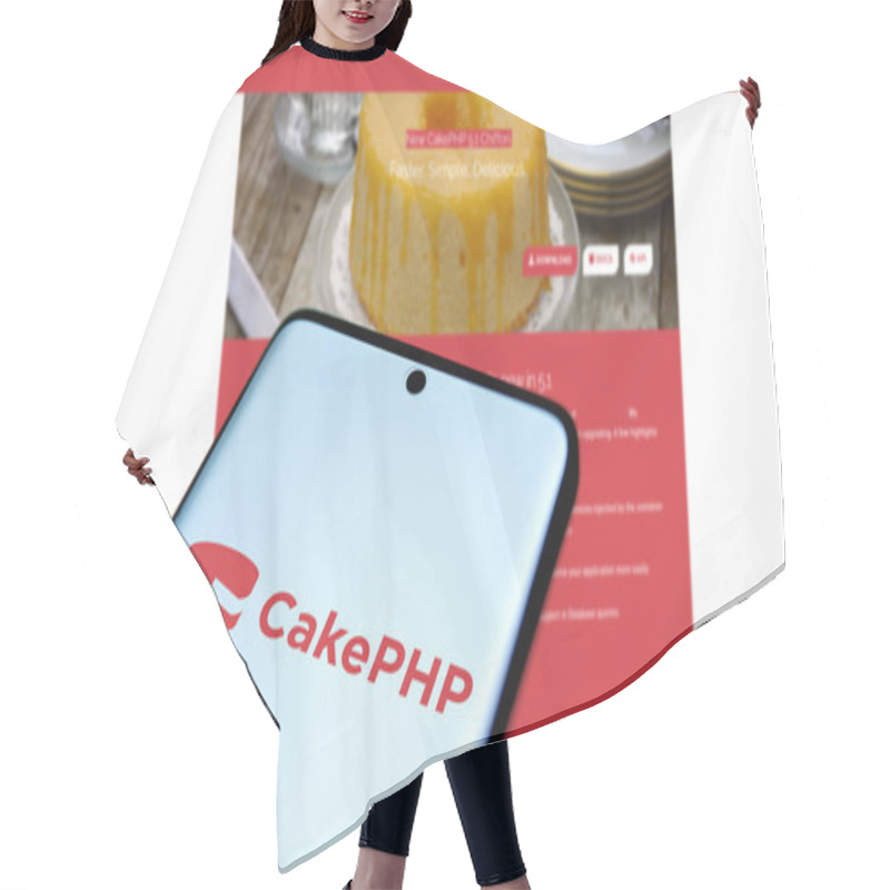 Personality  Dhaka, Bangladesh- 11 Nov 2024: CakePHP Logo Is Displayed On Smartphone. CakePHP Is An Open-source Web Framework. Hair Cutting Cape