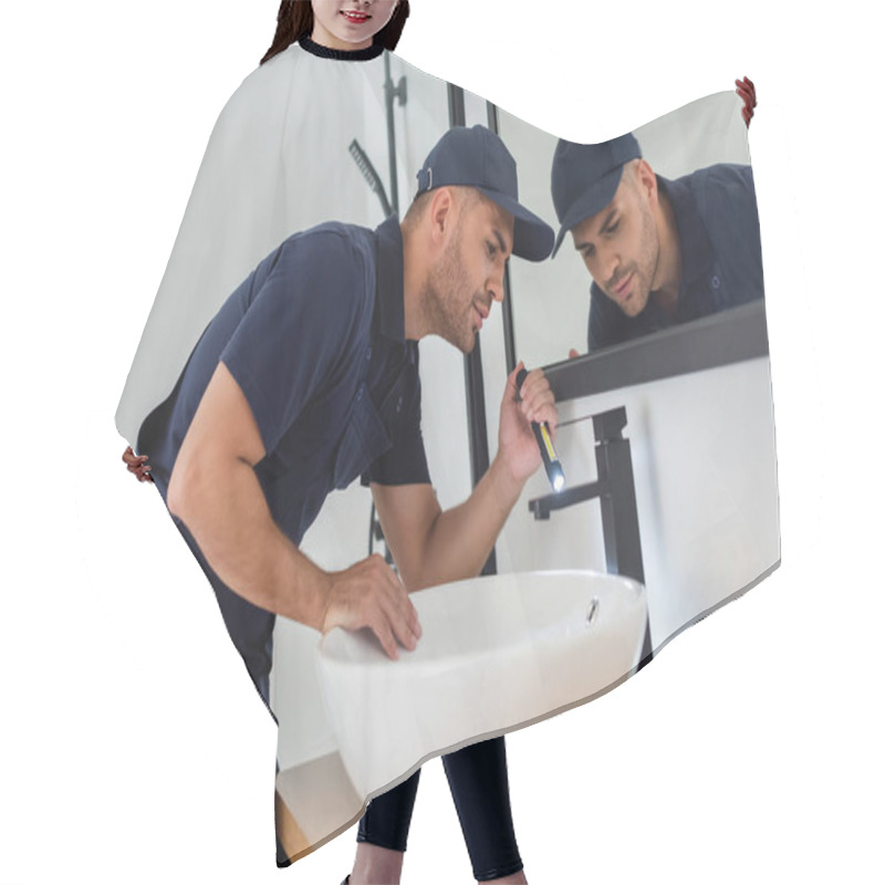 Personality  Plumber Checking Sink With Flashlight In Modern Bathroom Hair Cutting Cape