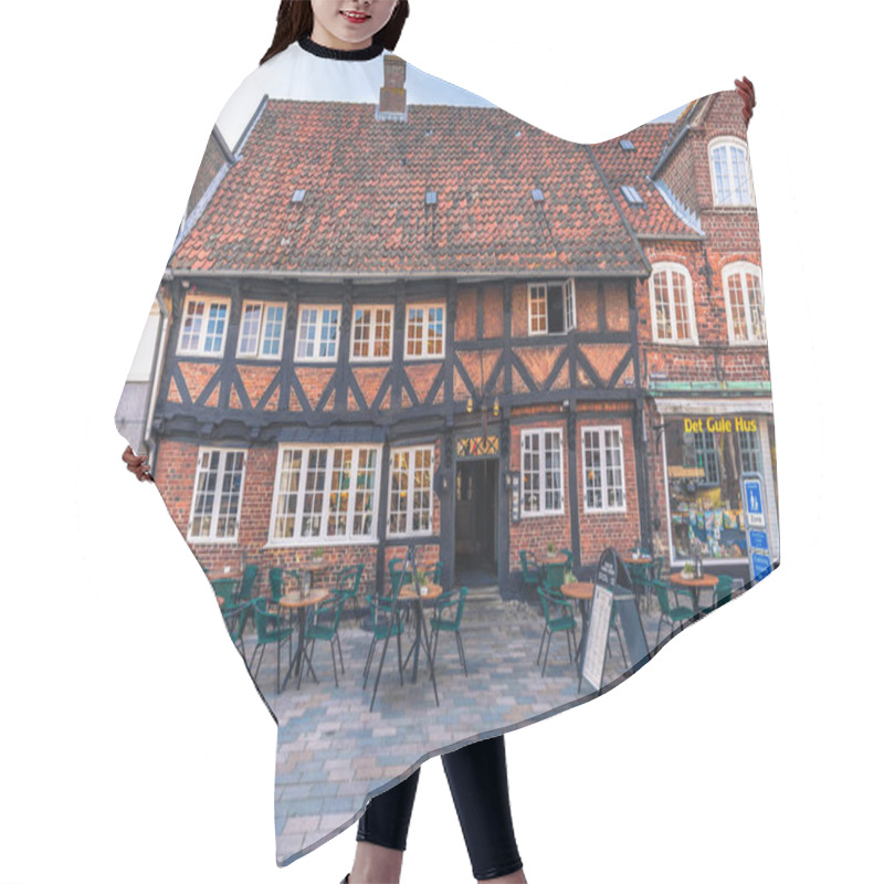 Personality  Ribe, Denmark - April 30, 2017: Old Town Of Ribe Hair Cutting Cape