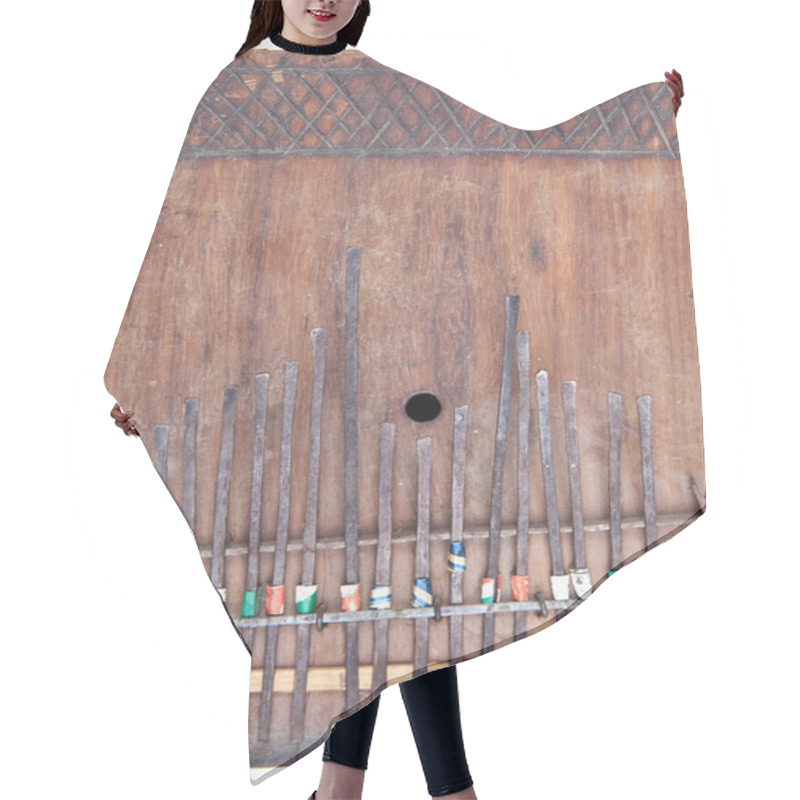 Personality  Home Made Wooden Kalimba, African Thumb Piano Isolated Backgroun Hair Cutting Cape