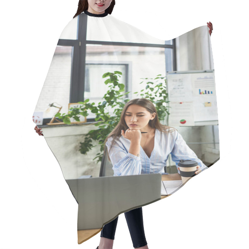 Personality  Brunette Woman Sips Coffee, Pondering Ideas In Her Stylish, Plant Filled Workspace. Hair Cutting Cape