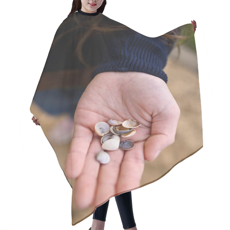 Personality  Close Up Of A Girl Holding Sea Shells In Her Hands. High Quality Photo Hair Cutting Cape