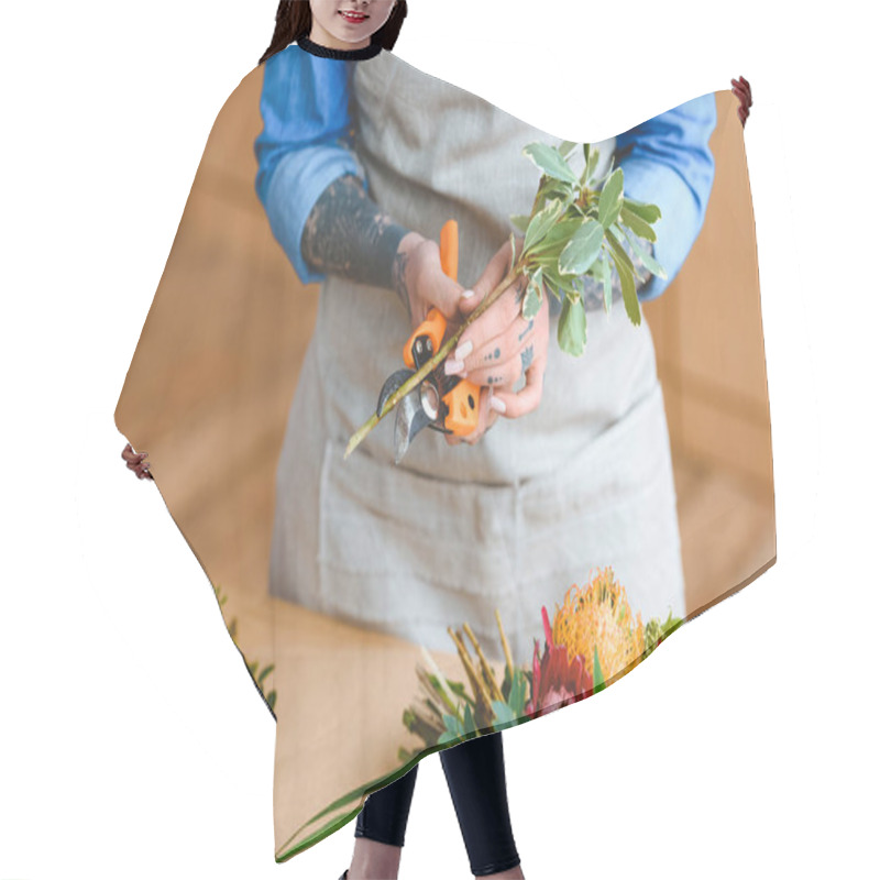 Personality  Mid Section Of Young Florist In Apron Cutting Plants At Workplace Hair Cutting Cape