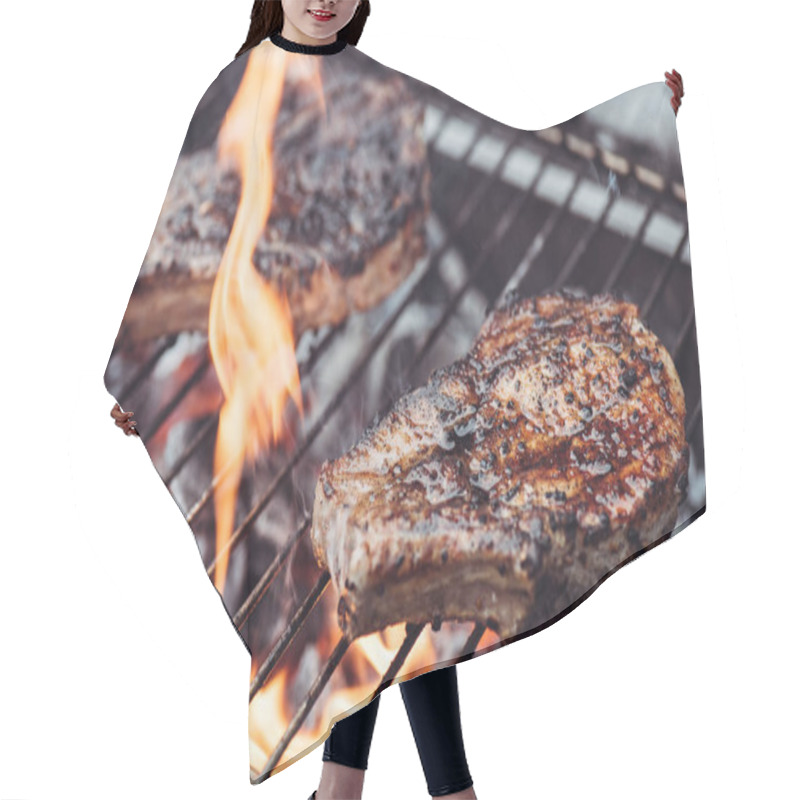 Personality  Selective Focus Of Juicy Tasty Steaks Grilling On Barbecue Grill Grade With Flame  Hair Cutting Cape