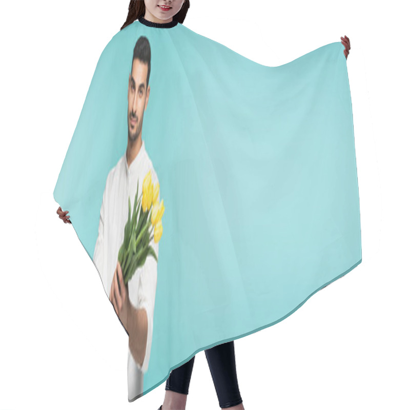 Personality  Young Arabian Man Holding Tulips Isolated On Blue, Banner  Hair Cutting Cape