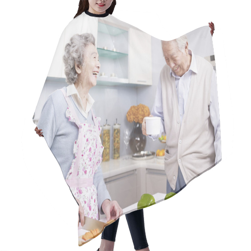 Personality  Senior Couple In Kitchen Hair Cutting Cape