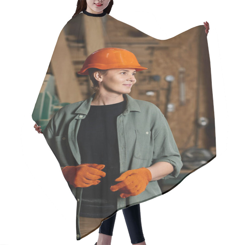 Personality  A Dedicated Female Carpenter Skillfully Works With Wood, Surrounded By Tools In Her Busy Workshop. Hair Cutting Cape