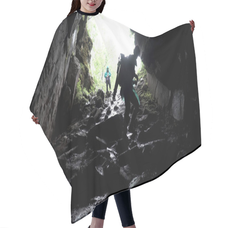 Personality  Young Explorer Standing In A Cave With Climbing Equipment Ready For Action, Travelling And Extreme Concept. Stock Footage. View From The Inside Of The Cave With Climbing Person. Hair Cutting Cape