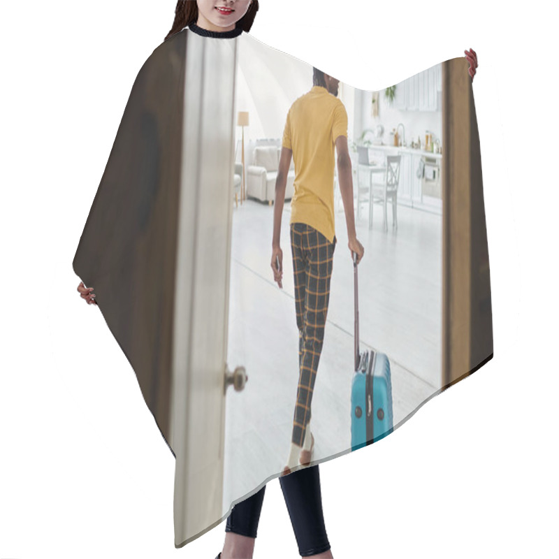 Personality  A Stylish Young Man Grabs His Suitcase, Ready To Leave His Apartment For An Adventure. Hair Cutting Cape