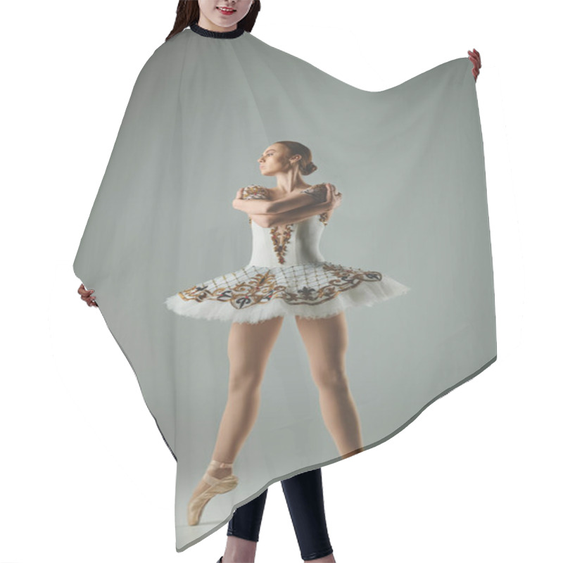 Personality  A Young Beautiful Ballerina In A White Tutu Striking A Graceful Pose. Hair Cutting Cape