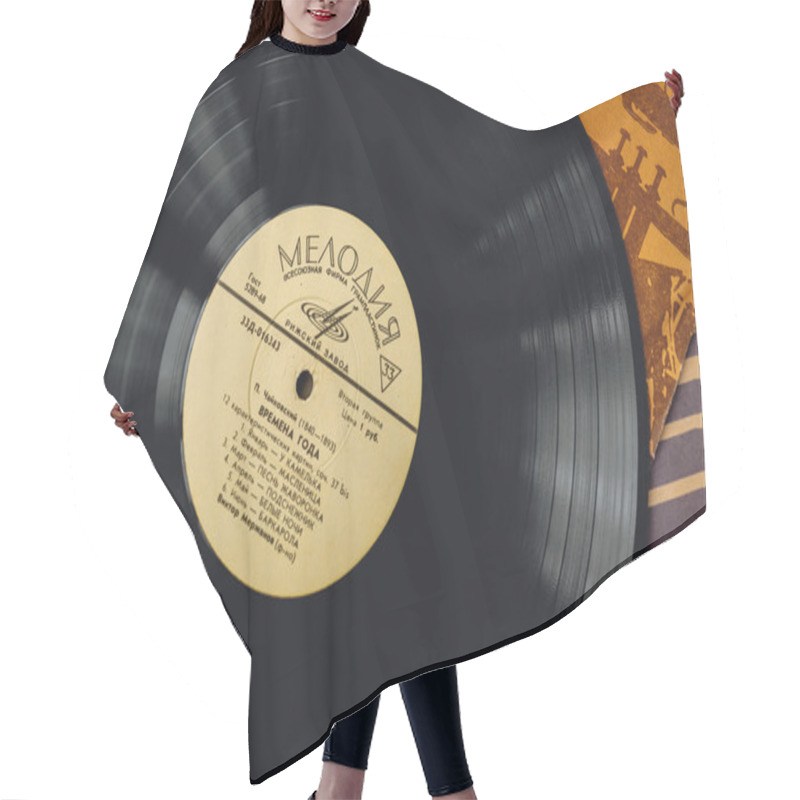 Personality  Old Vinyl Records Stack. Hair Cutting Cape