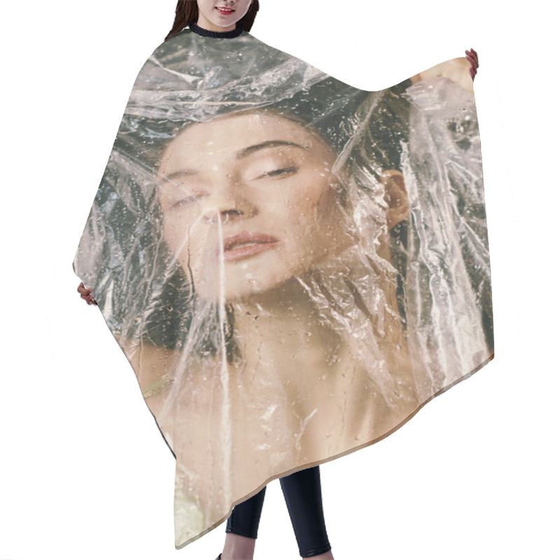 Personality  A Woman Poses With Plastic Draped Over Her, Her Eyes Closed And Her Expression Serene. Hair Cutting Cape