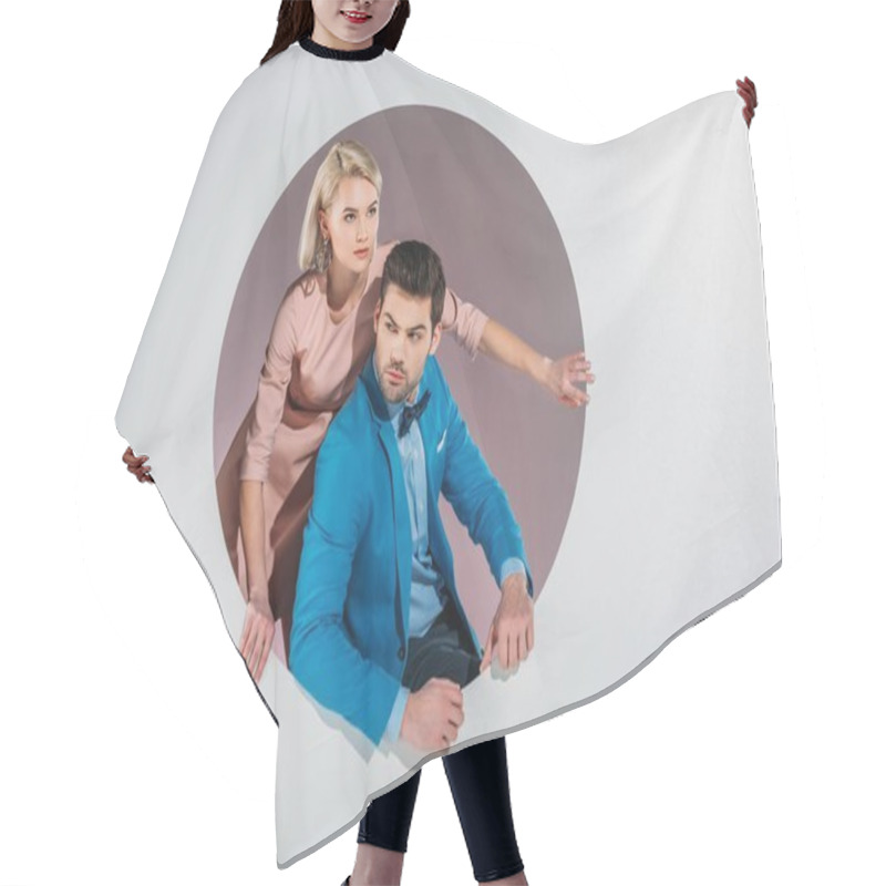 Personality  Stylish Young Couple Peering Out Hole On Grey  Hair Cutting Cape