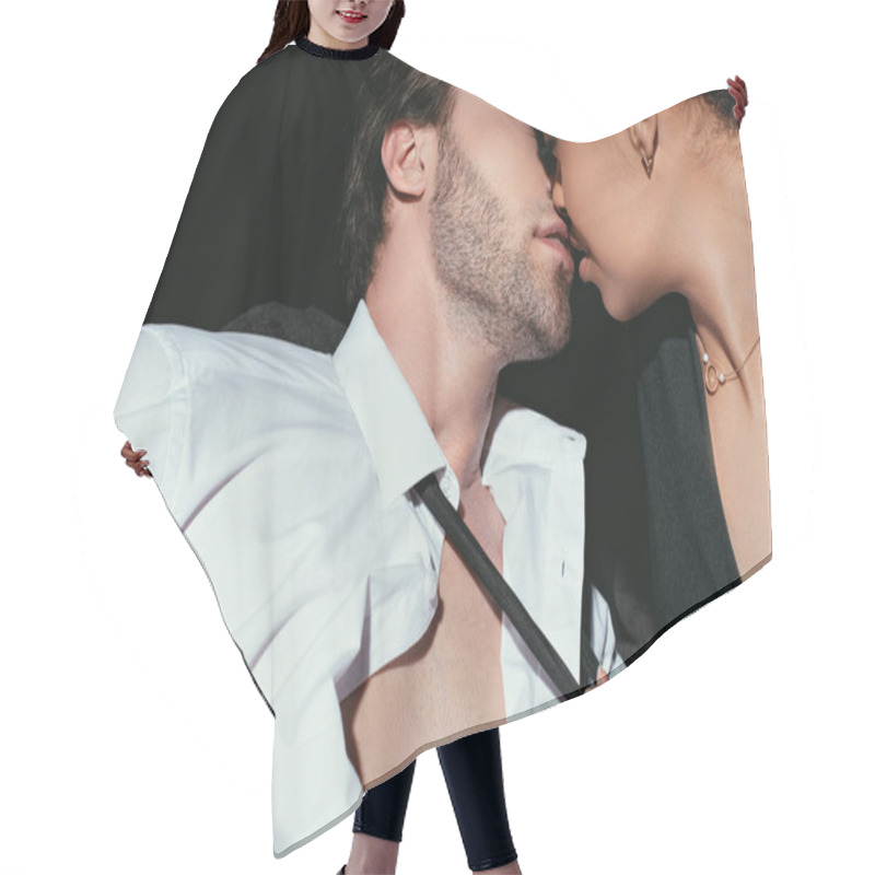 Personality  Young Multiracial Sexy Couple In Black Clothing Kissing On Dark Background Hair Cutting Cape