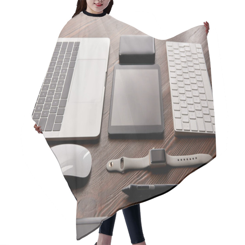 Personality  Assembled Various Modern Gadgets On Wooden Table Hair Cutting Cape