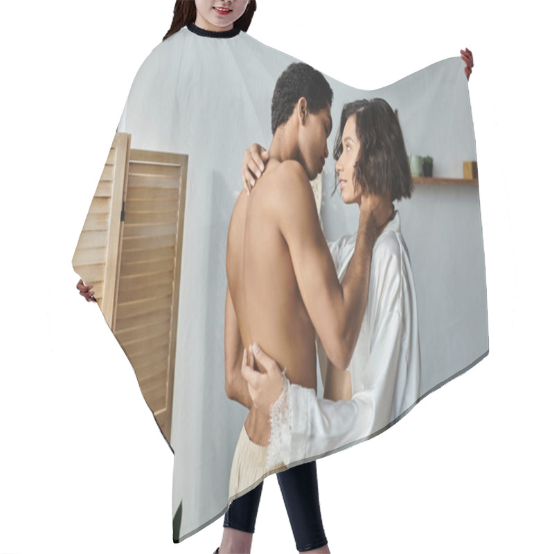 Personality  A Young Asian Woman And Black Man Embrace Passionately In Bed, Their Eyes Locked In A Loving Gaze. Hair Cutting Cape