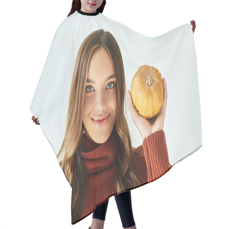 Personality  A Beautiful Woman In A Halloween Costume Smiles Brightly, Showcasing Her Pumpkin Indoors. Hair Cutting Cape