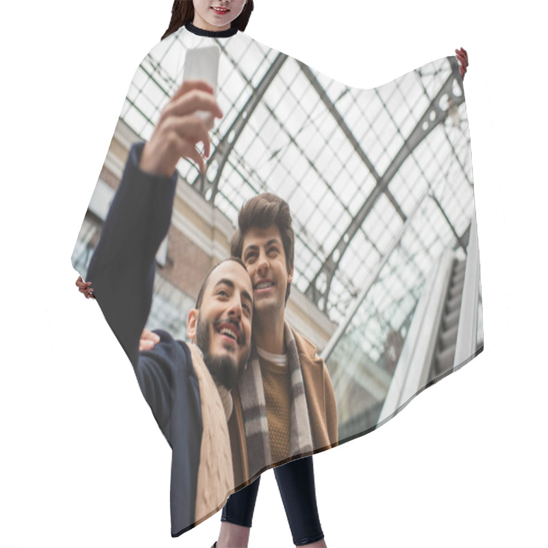 Personality  Bearded Gay Man Taking Selfie With Young Boyfriend In Plaid Scarf On Escalator Hair Cutting Cape