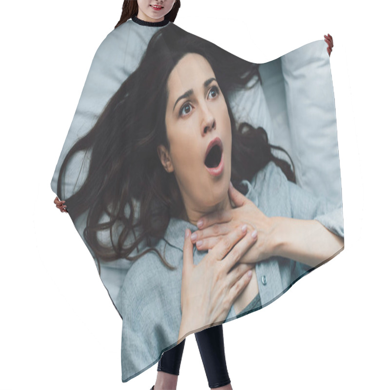 Personality  Top View Of Scared Brunette Woman Touching Throat While Lying On Bed  Hair Cutting Cape