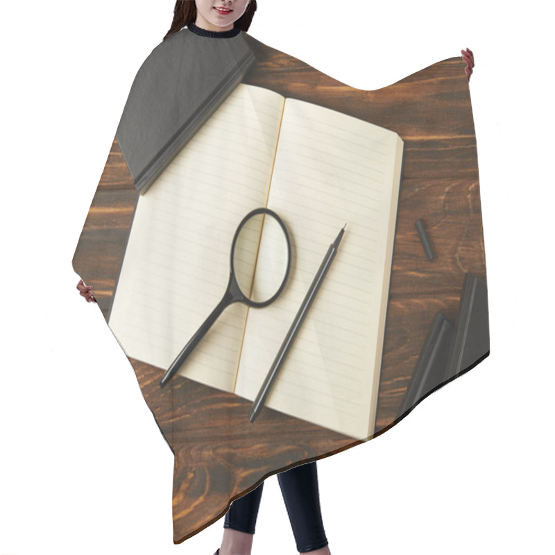 Personality  Top View Of Magnifying Glass, Notebooks And Pen On Wooden Table Hair Cutting Cape