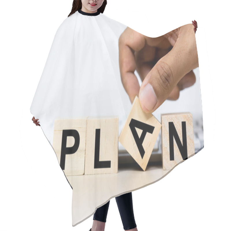 Personality  Planning Concept. Wooden Cube With Text PLAN On Table Keyboard Computer Background. Good Leader Must Have A Strategic Plan. Hand Picking Character A. Hair Cutting Cape