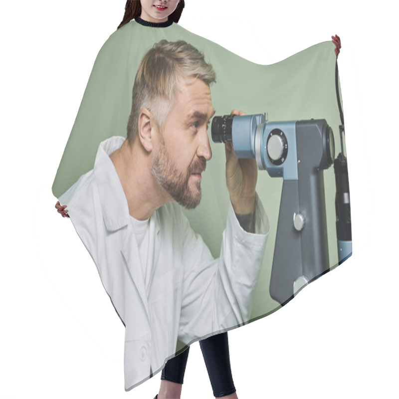 Personality  A Man Examines Someones Vision. Hair Cutting Cape