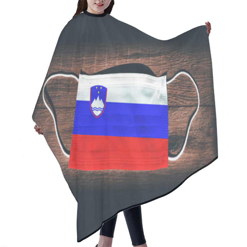 Personality  Slovenia National Flag At Medical, Surgical, Protection Mask On Black Wooden Background. Coronavirus Covid19, Prevent Infection, Illness Or Flu. State Of Emergency, Lockdown. Hair Cutting Cape