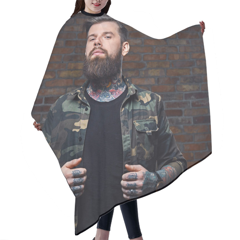 Personality  Tattooed Bearded Male In Military Jacket. Hair Cutting Cape