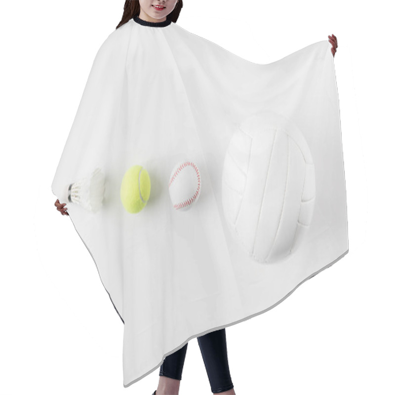 Personality  Various Sports Equipment In Row On White Surface Hair Cutting Cape