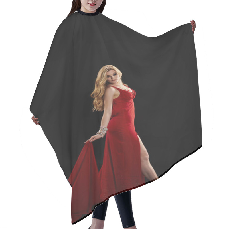 Personality  A Graceful Woman In A Vibrant Red Dress Strikes A Pose. Hair Cutting Cape