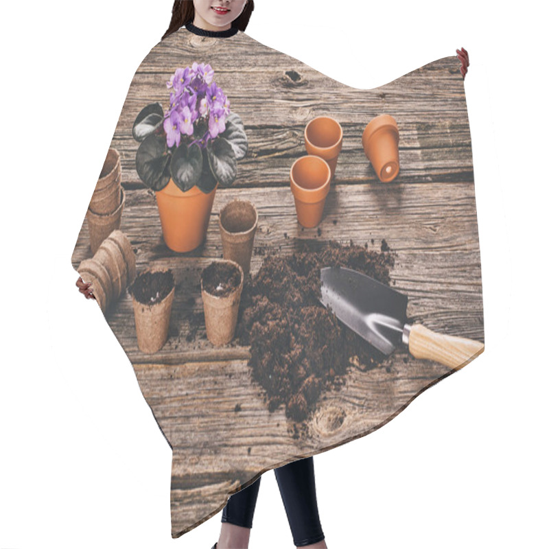 Personality  Planting A Potted Plant On Natural Wooden Background In Garden Hair Cutting Cape