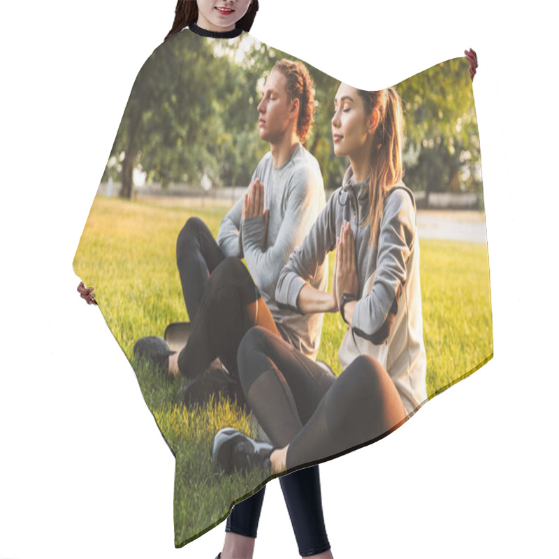 Personality  Image Of Concentrated Fitness Sport Loving Couple Friends In Park Outdoors Make Meditate Exercises. Hair Cutting Cape