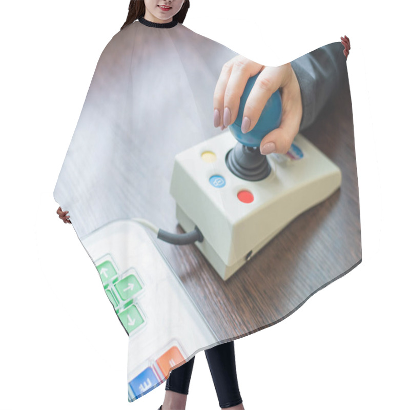 Personality  Woman With Cerebral Palsy Works On A Specialized Computer Mouse. Hair Cutting Cape