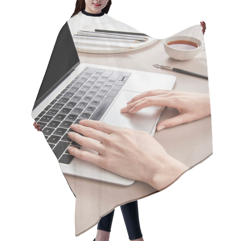 Personality  Cropped View Of Woman Using Laptop Near Cup Of Tea On Beige Surface Hair Cutting Cape