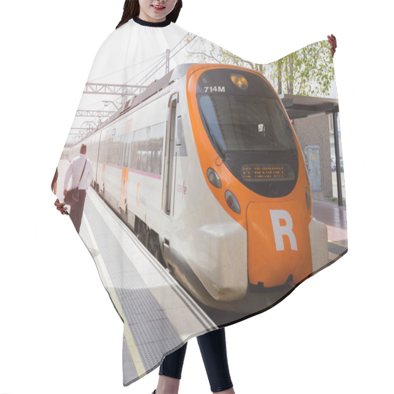 Personality  BARCELONA, SPAIN - APRIL 27, 2018: Passengers Board The Renfe Train At El Prat Airport At The Station Hair Cutting Cape