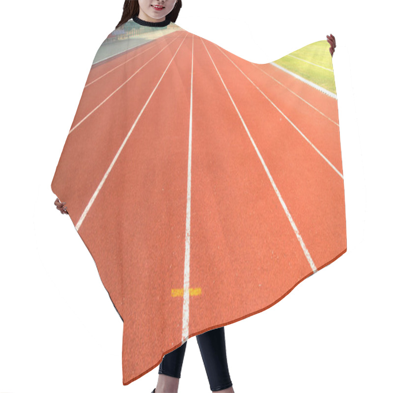 Personality  Red Running Track In Stadium. Hair Cutting Cape