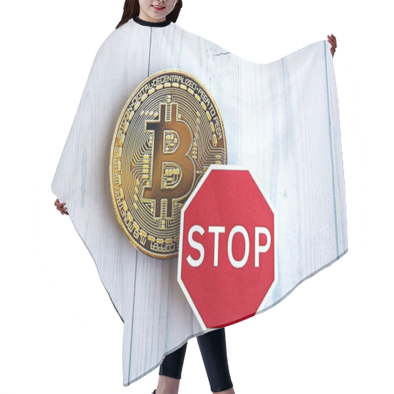 Personality  KYIV, UKRAINE - AUGUST 17, 2024 Bitcoin BTC Coin And Red Paper Stop Sign On Wooden Background Close Up Hair Cutting Cape